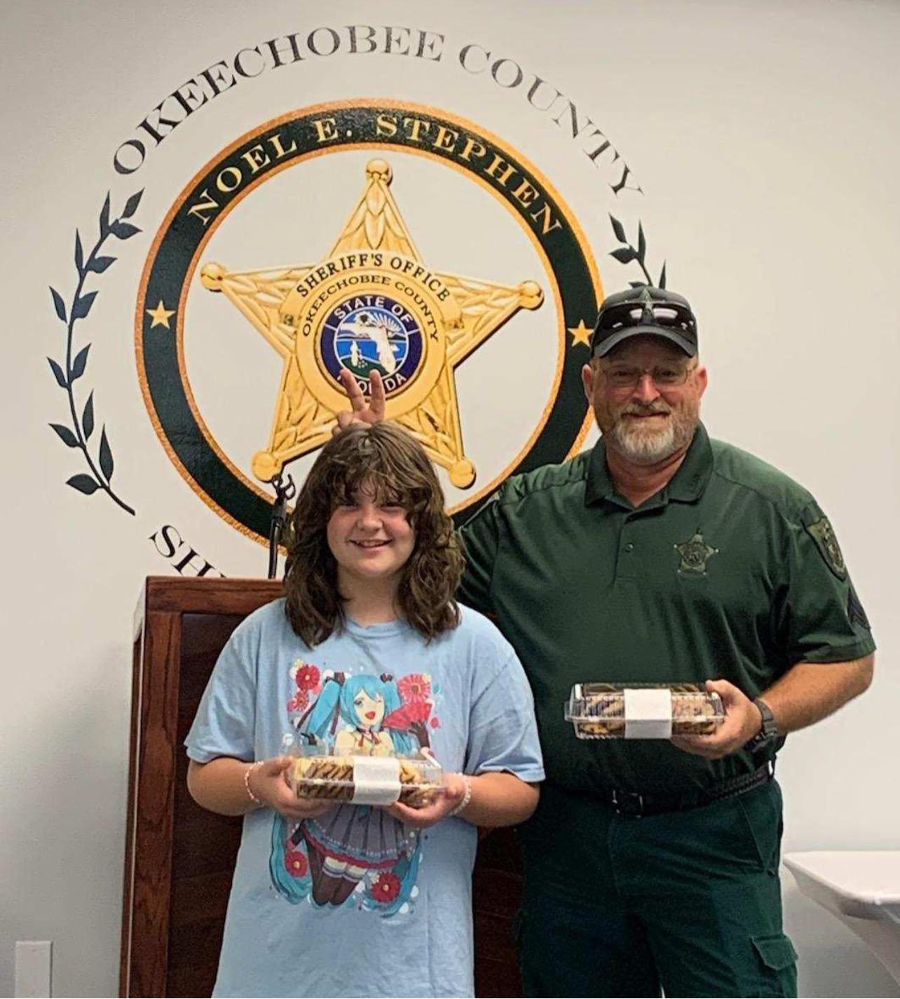 Corporal William Hill was the lucky guy to accept Miss Kay’s cookie donation for the deputies.

This amazing young woman and her mother always seem to stop by at the right time with treats for the men and women protecting and servicing!